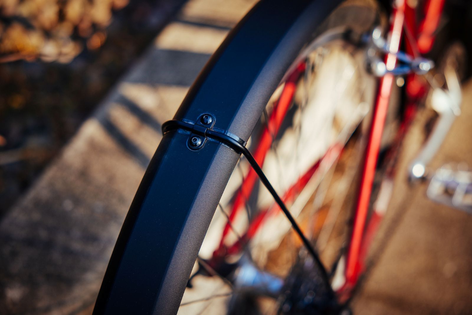 Image of bicycle fender with detail on hardware