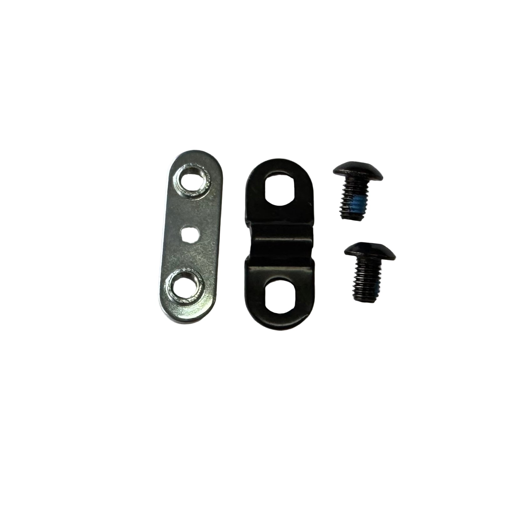 Metal components and screws on a gray background